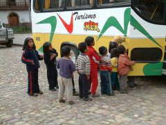 02-Children waiting for our bus for some candy